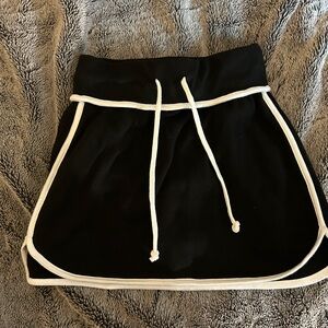Black and white athletic skort - sweatpants material , only worn once . Size xs